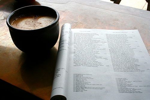coffee mug with book adjacent